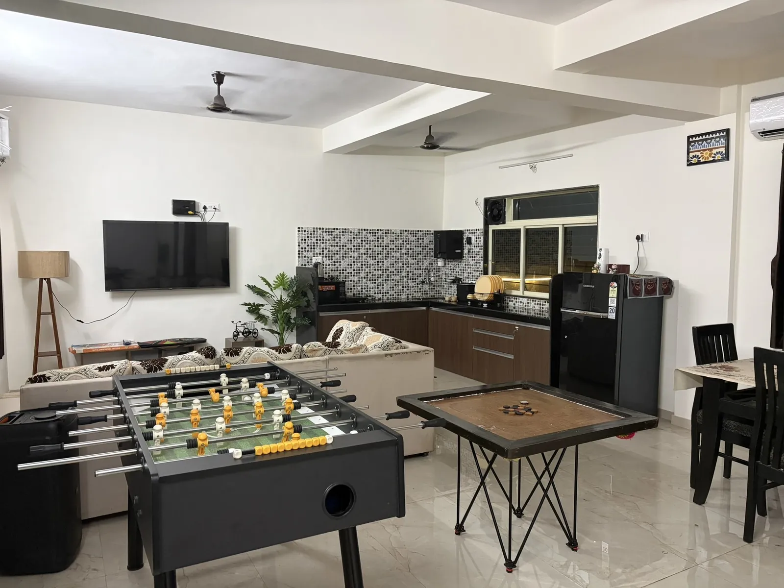 Open living hall with foosball and carrom at Nandan Villa