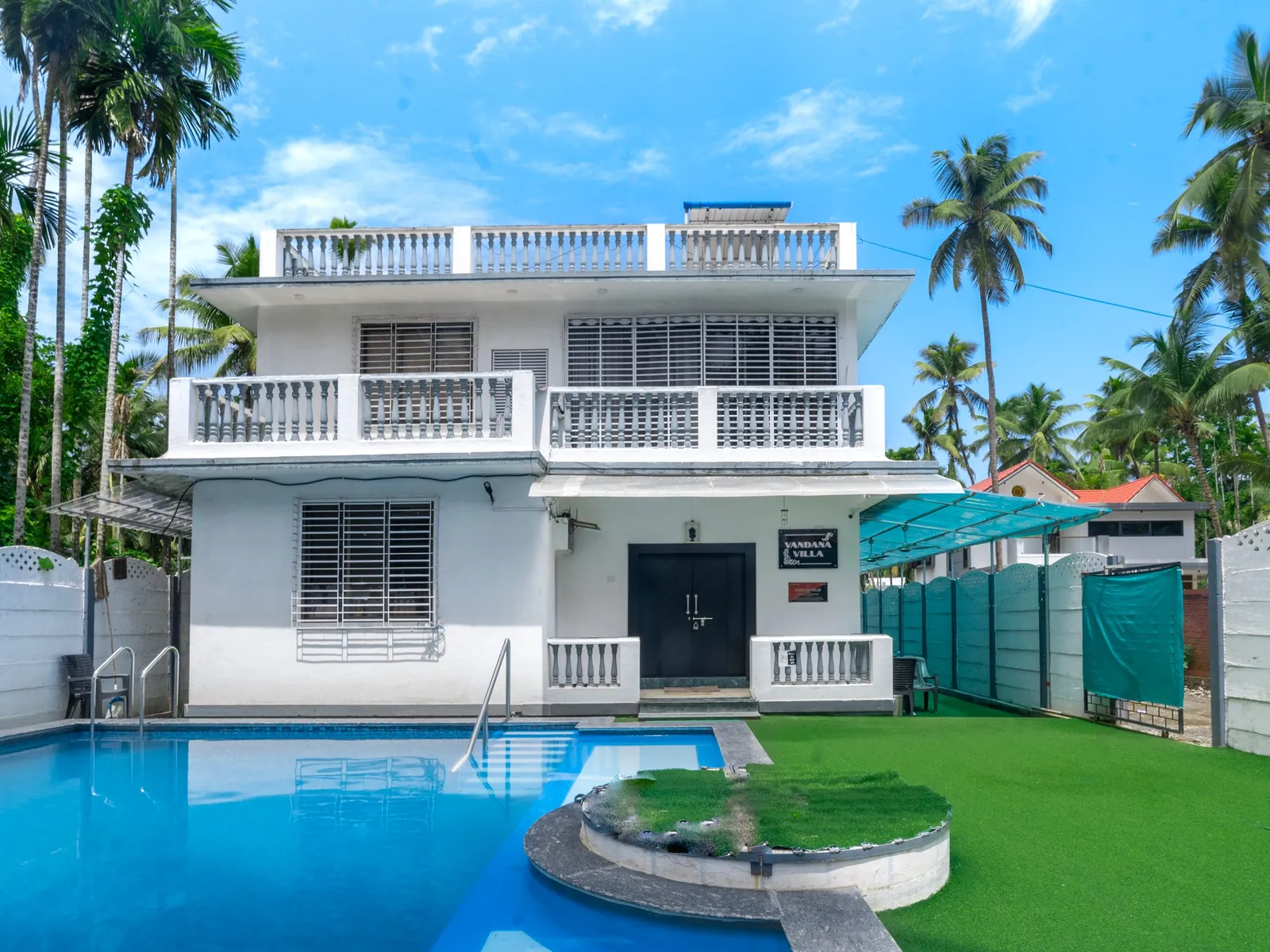 Vandana Villa in Chaul, Alibag: the villa, its private pool and lawn